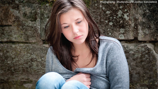 teen-sitting-sad